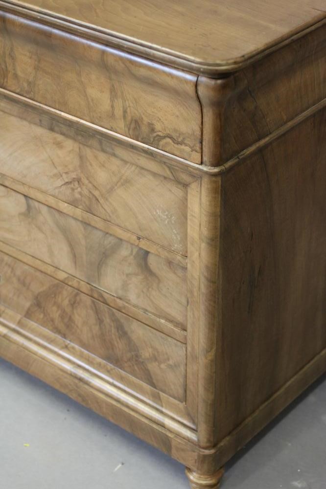 A FRENCH BLEACHED WALNUT COMMODE Image