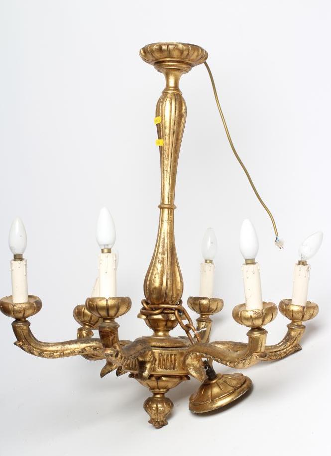 A CARVED GILT WOOD SIX LIGHT PENDANT Image