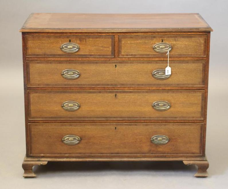 A GEORGIAN OAK AND MAHOGANY BANDED CHEST Image