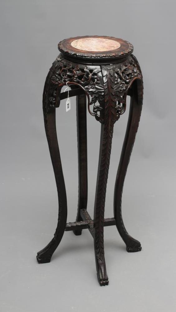 A CHINESE PADOUK WOOD JARDINIERE STAND Image
