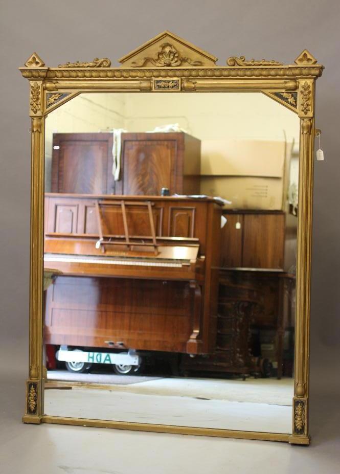 A VICTORIAN GILT GESSO AND EBONISED PIER GLASS Image