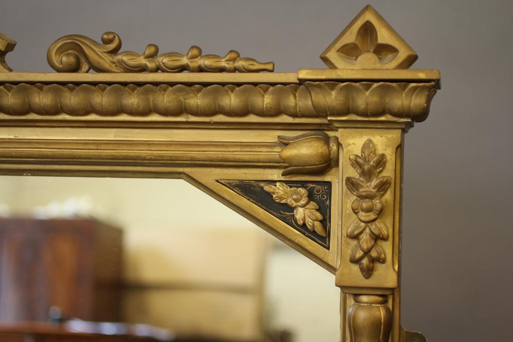A VICTORIAN GILT GESSO AND EBONISED PIER GLASS Image