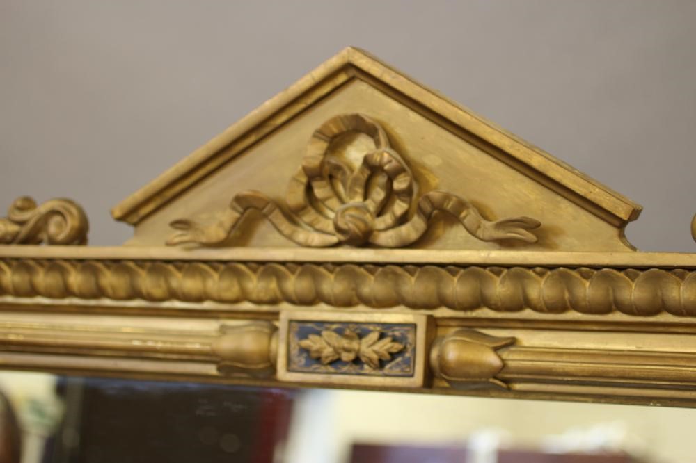 A VICTORIAN GILT GESSO AND EBONISED PIER GLASS Image