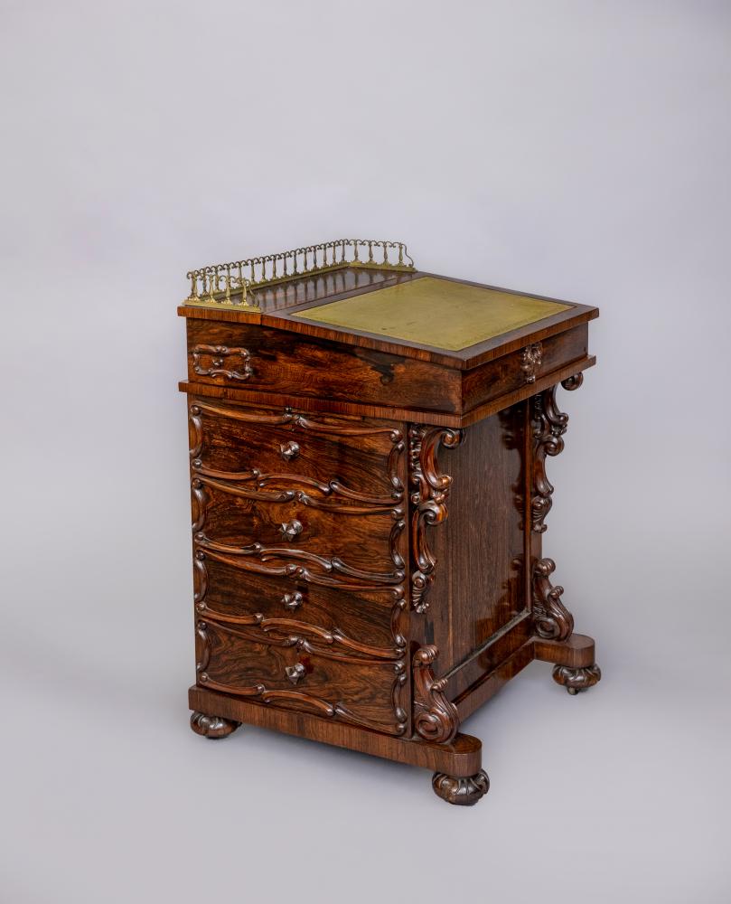 A VICTORIAN ROSEWOOD DAVENPORT Image