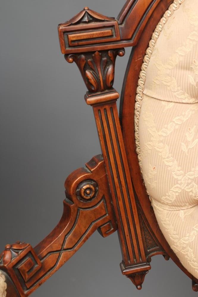 A PAIR OF LADY'S AND A GENTLEMAN'S VICTORIAN WALNUT SHOW FRAME EASY CHAIRS Image
