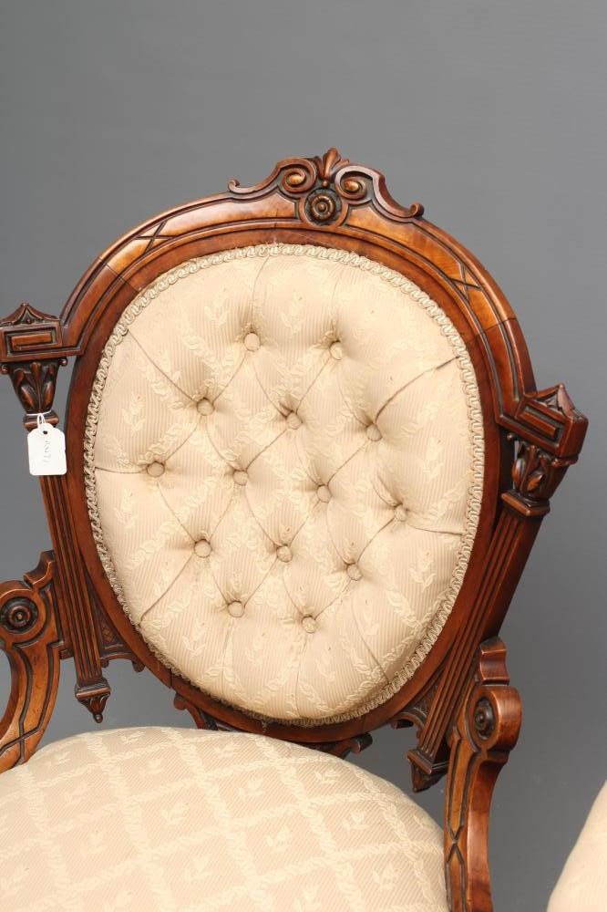 A PAIR OF LADY'S AND A GENTLEMAN'S VICTORIAN WALNUT SHOW FRAME EASY CHAIRS Image
