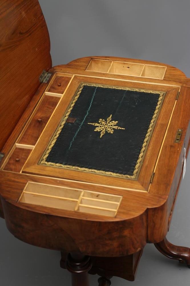A VICTORIAN WALNUT AND MARQUETRY WORK TABLE of oblong form with rounded ends Image