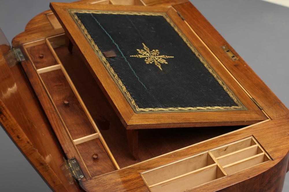 A VICTORIAN WALNUT AND MARQUETRY WORK TABLE of oblong form with rounded ends Image