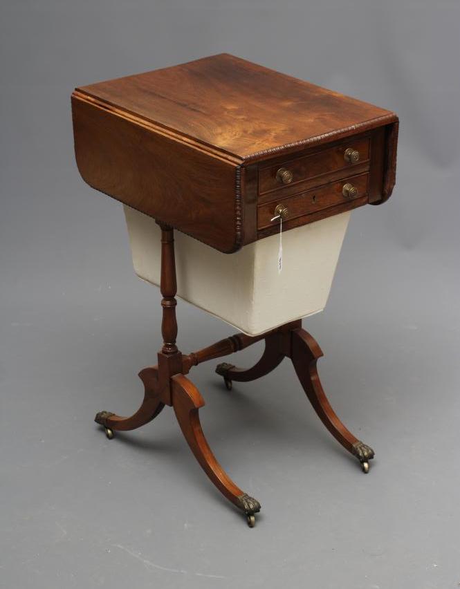 A REGENCY ROSEWOOD SEWING TABLE Image