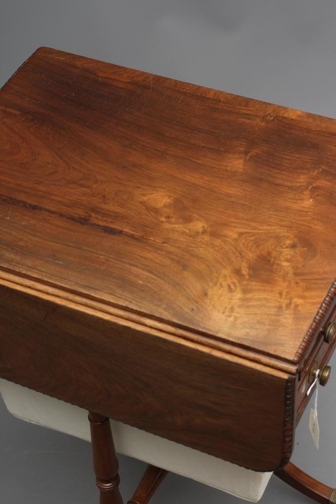 A REGENCY ROSEWOOD SEWING TABLE Image