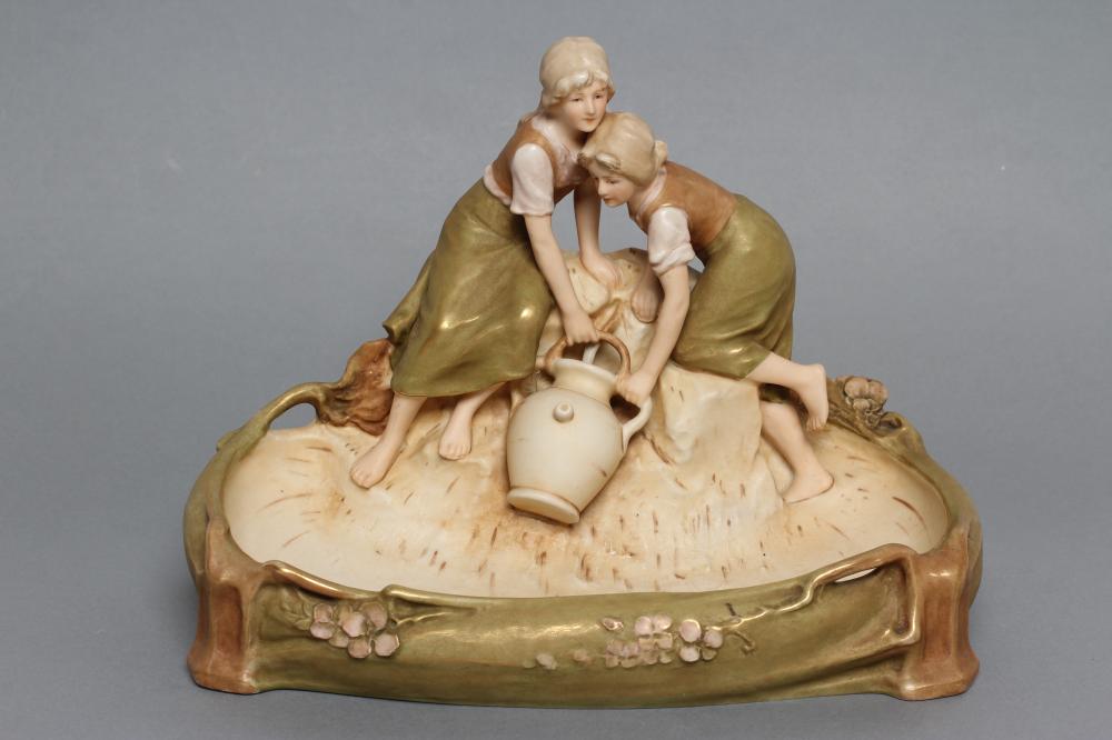 A ROYAL DUX PORCELAIN FIGURAL SIDE DISH/FLOWER HOLDER Image