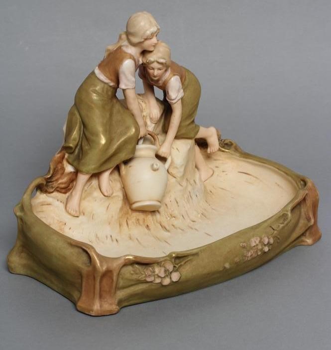 A ROYAL DUX PORCELAIN FIGURAL SIDE DISH/FLOWER HOLDER Image