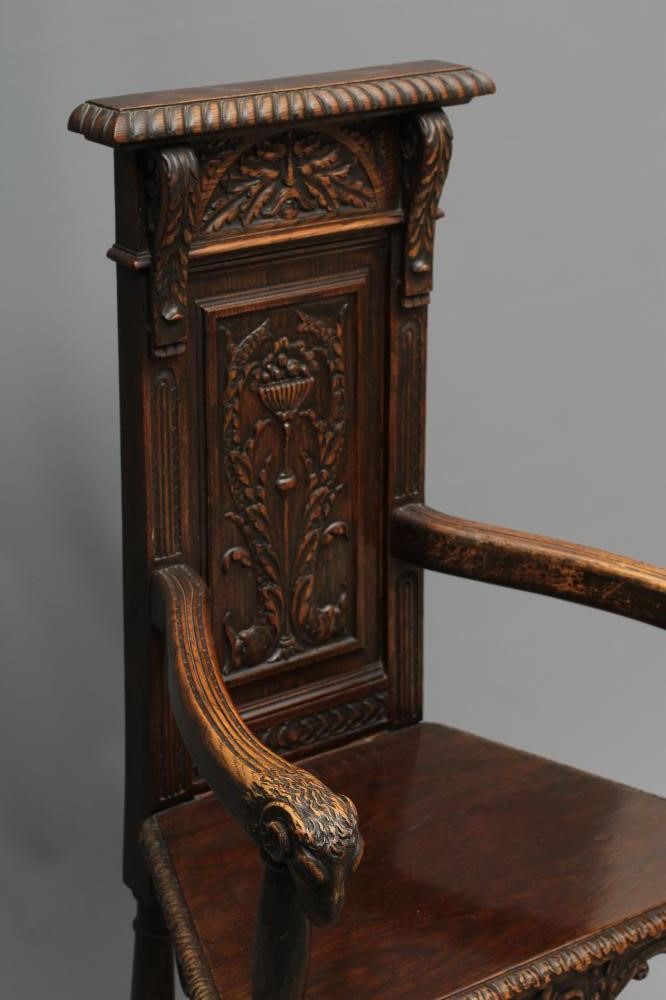 A CARVED OAK CAQUETOIRE TYPE ARMCHAIR Image