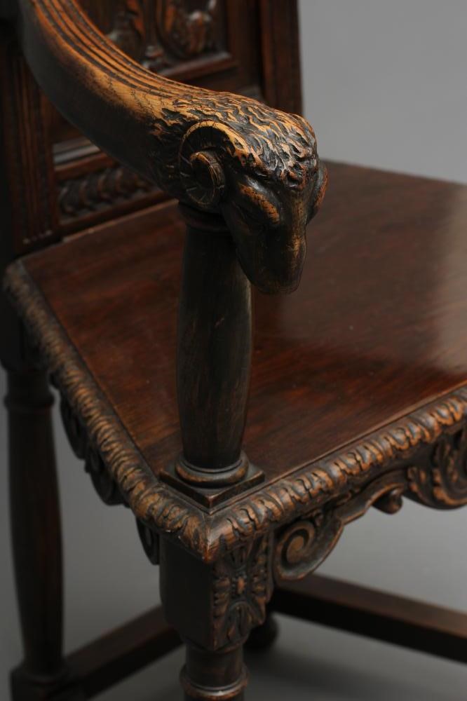 A CARVED OAK CAQUETOIRE TYPE ARMCHAIR Image