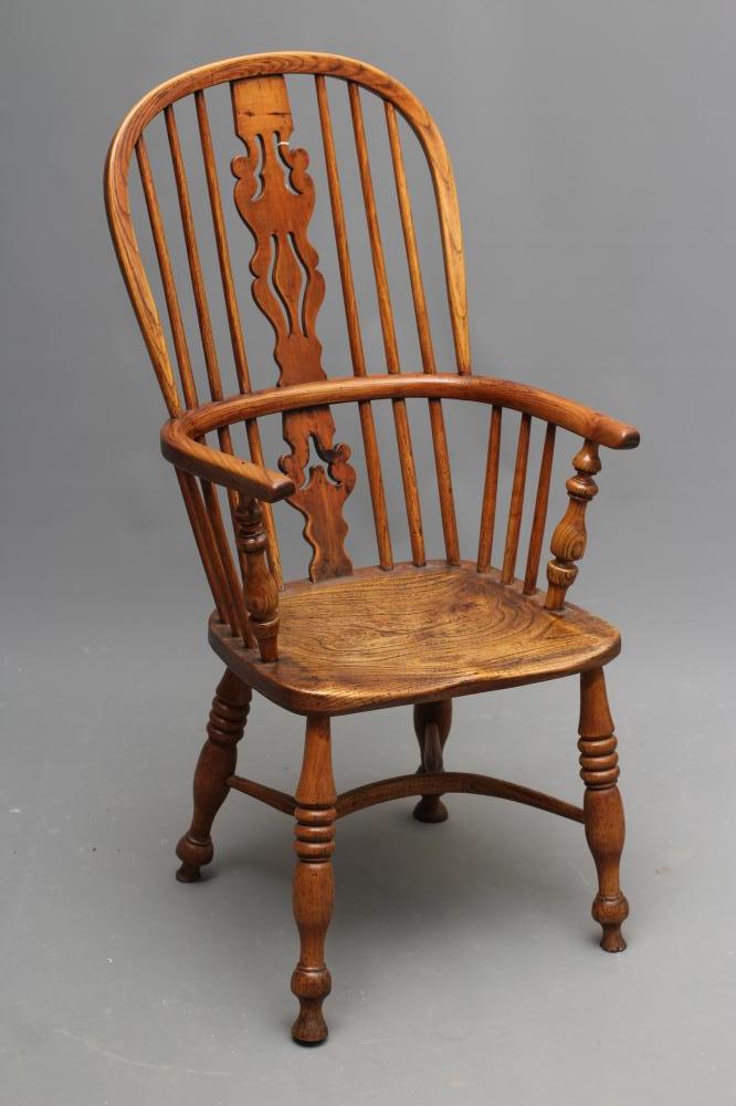 AN ASH AND ELM HIGH HOOP BACK WINDSOR ARMCHAIR Image