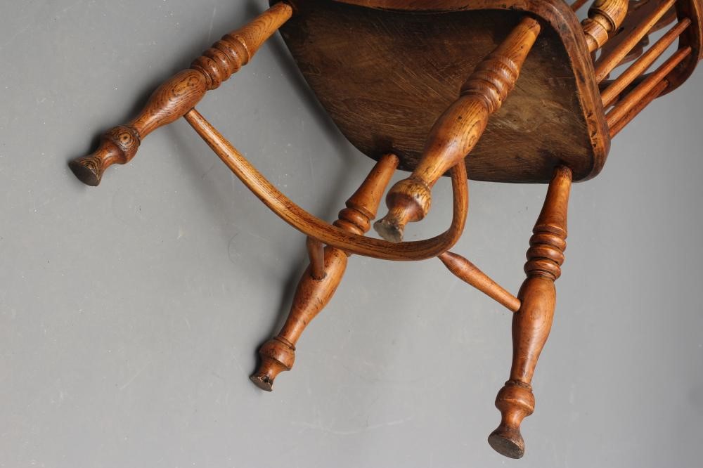 AN ASH AND ELM HIGH HOOP BACK WINDSOR ARMCHAIR Image