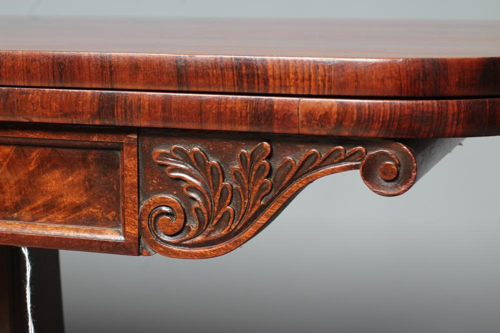 A REGENCY MAHOGANY FOLDING TEA TABLE Image