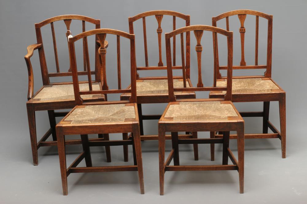 A SET OF FIVE GEORGIAN COUNTRY ELM DINING CHAIRS including an elbow chair Image