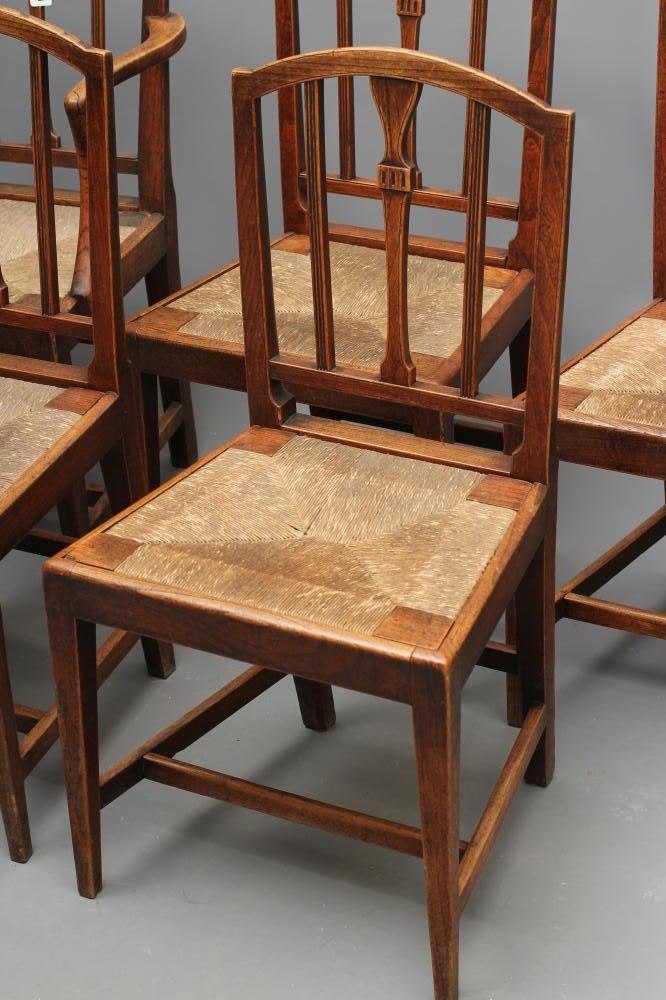 A SET OF FIVE GEORGIAN COUNTRY ELM DINING CHAIRS including an elbow chair Image