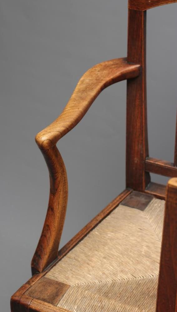 A SET OF FIVE GEORGIAN COUNTRY ELM DINING CHAIRS including an elbow chair Image