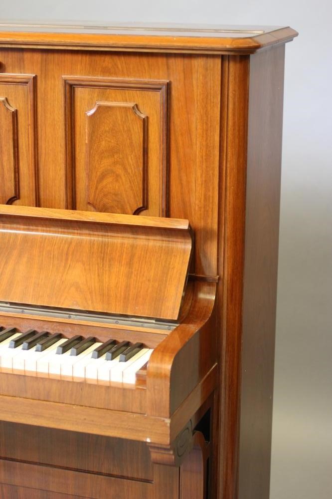 A ROSEWOOD CASED BECHSTEIN UPRIGHT PIANO Image