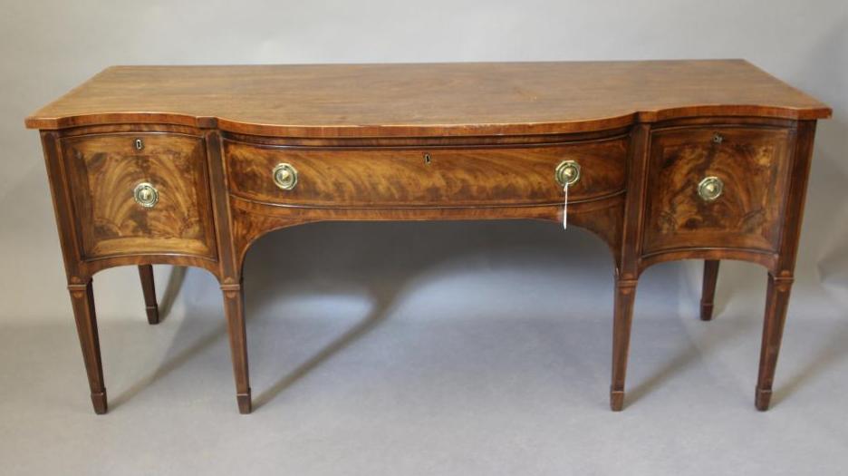 A GEORGIAN MAHOGANY SIDEBOARD Image