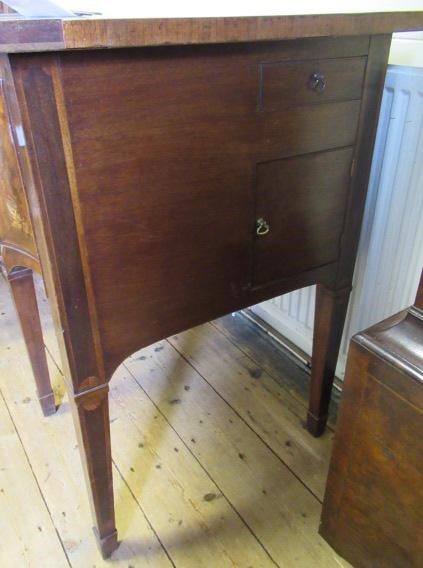 A GEORGIAN MAHOGANY SIDEBOARD Image