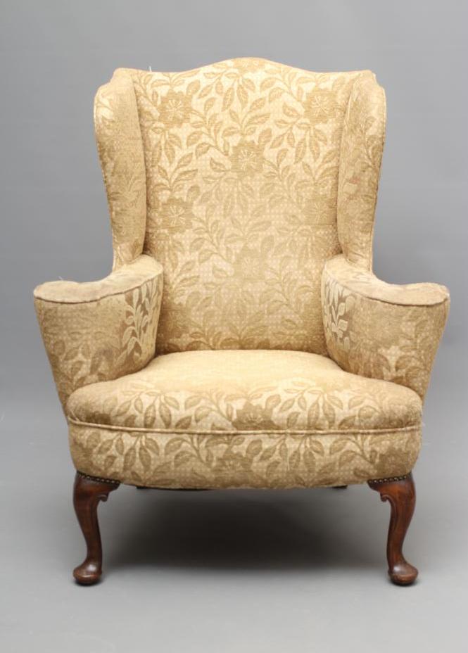 A MAHOGANY FRAMED GEORGIAN DESIGN WING ARMCHAIR Image