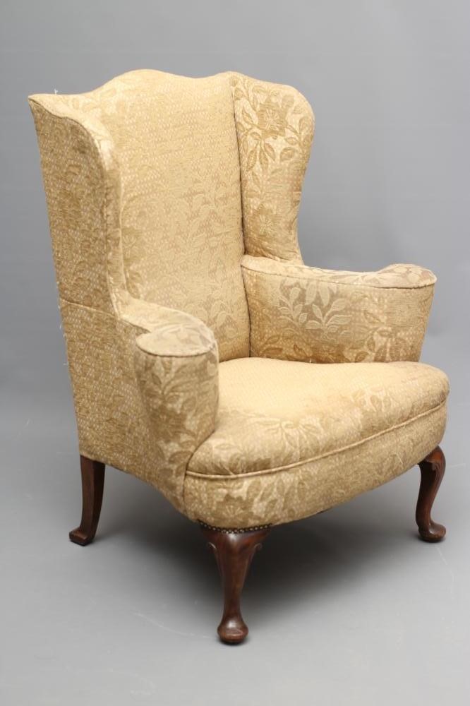 A MAHOGANY FRAMED GEORGIAN DESIGN WING ARMCHAIR Image