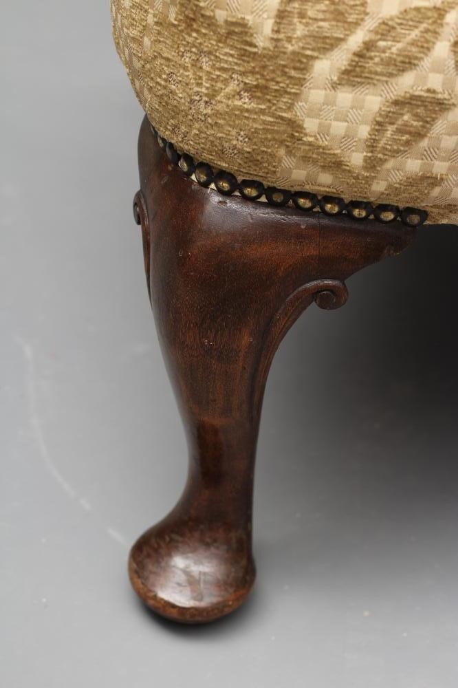 A MAHOGANY FRAMED GEORGIAN DESIGN WING ARMCHAIR Image