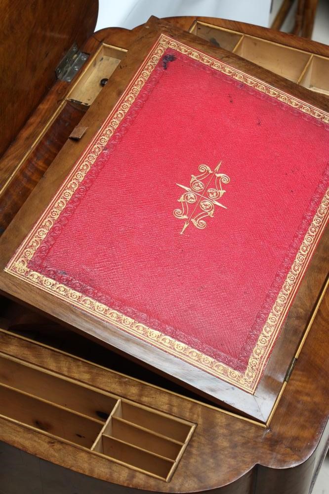 A VICTORIAN BURR WALNUT WORK/WRITING TABLE of oblong form with rounded ends Image