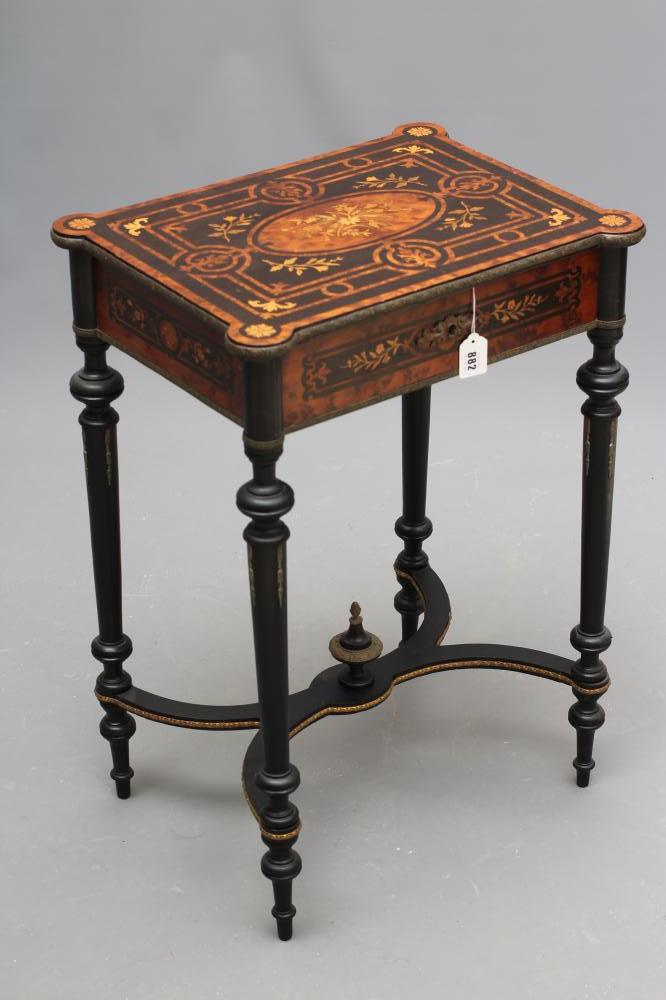 A VICTORIAN EBONISED AND YEW WOOD BANDED WORK TABLE of oblong form protruding corners and gilt metal Image