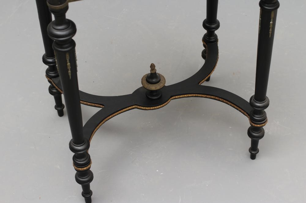 A VICTORIAN EBONISED AND YEW WOOD BANDED WORK TABLE of oblong form protruding corners and gilt metal Image