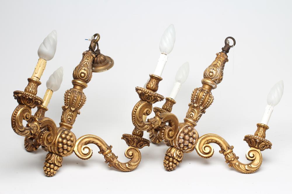 A PAIR OF CARVED GILT WOOD LIGHT PENDANTS Image