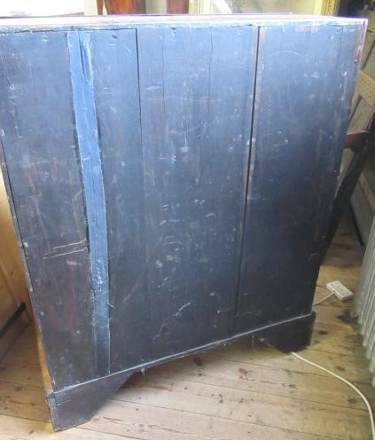 A GEORGIAN BURR WALNUT AND FEATHER BANDED BUREAU Image