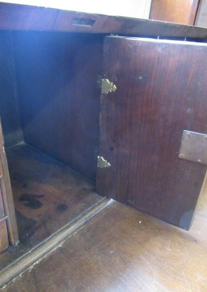 A GEORGIAN BURR WALNUT AND FEATHER BANDED BUREAU Image