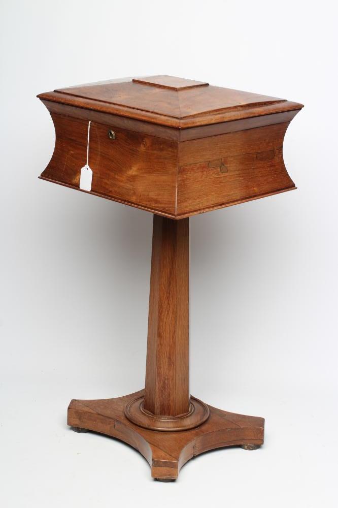 AN EARLY VICTORIAN ROSEWOOD TEAPOY of sarcophagus form Image