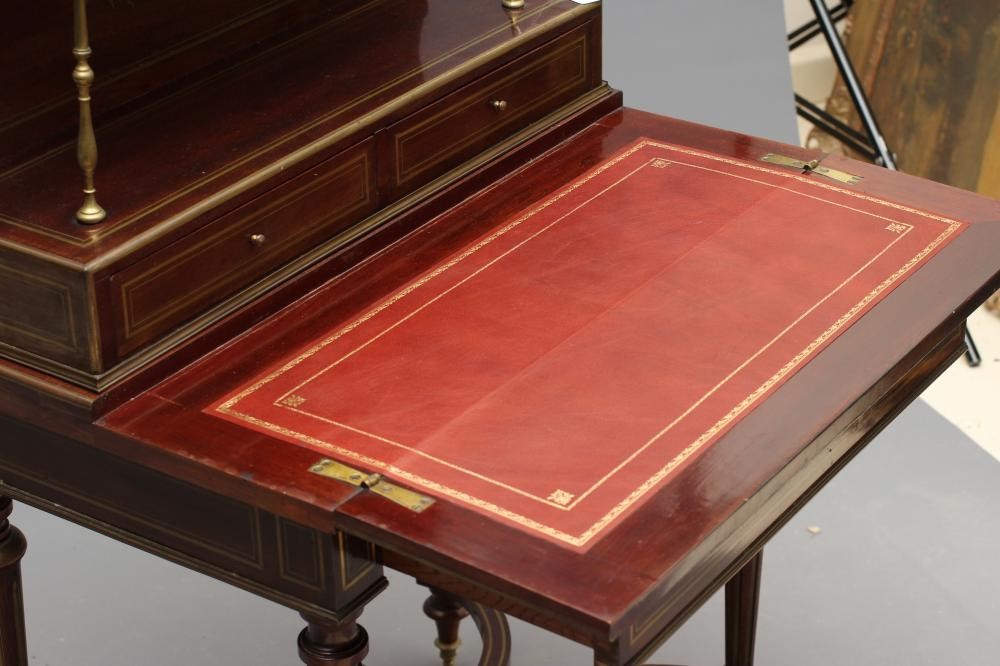 A ROSEWOOD AND BRASS INLAID BONHEUR DU JOUR Image