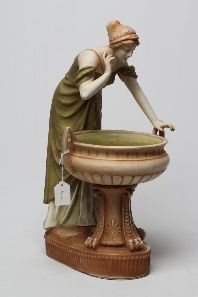 AN AMPHORA PORCELAIN FIGURAL TABLE CENTREPIECE Image