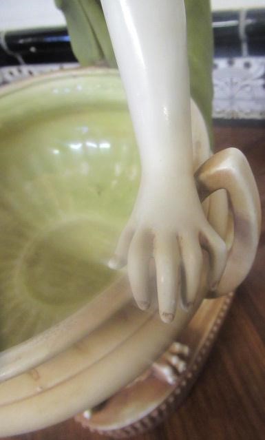 AN AMPHORA PORCELAIN FIGURAL TABLE CENTREPIECE Image