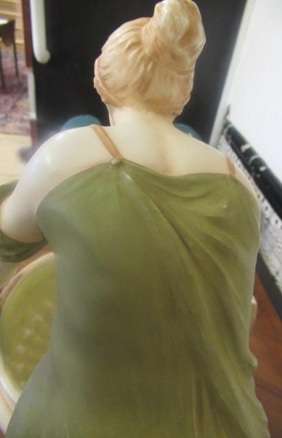 AN AMPHORA PORCELAIN FIGURAL TABLE CENTREPIECE Image