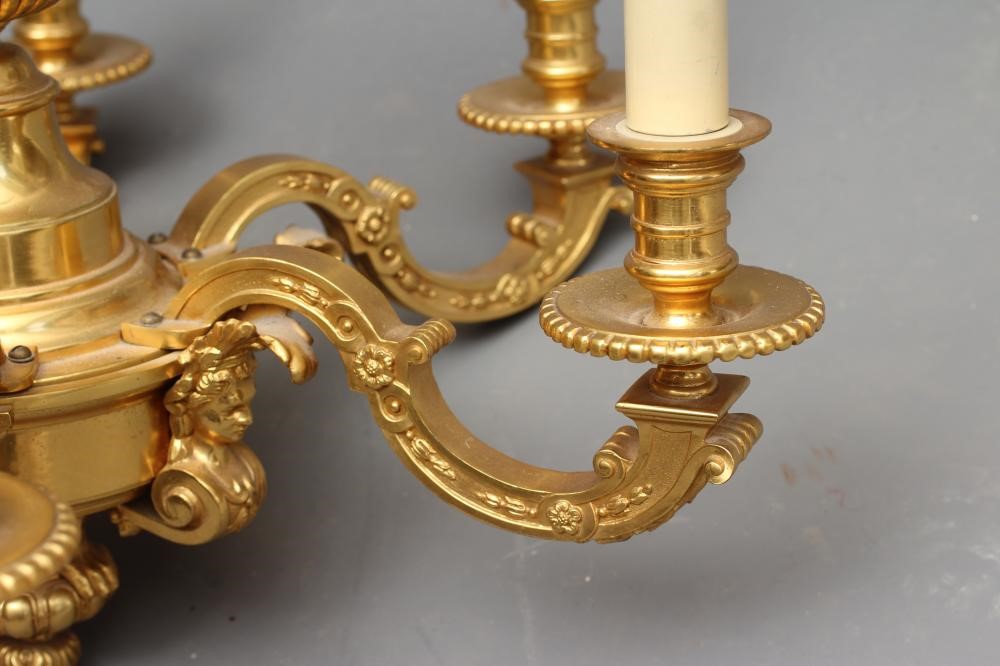 A FRENCH ORMOLU SIX LIGHT CHANDELIER Image