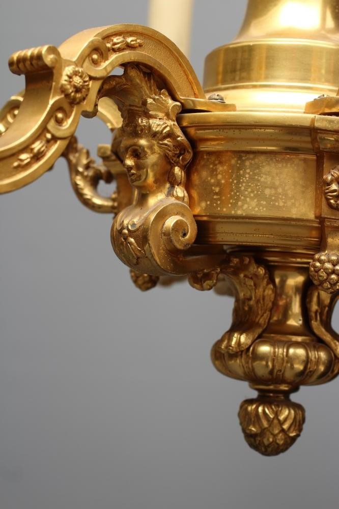 A FRENCH ORMOLU SIX LIGHT CHANDELIER Image