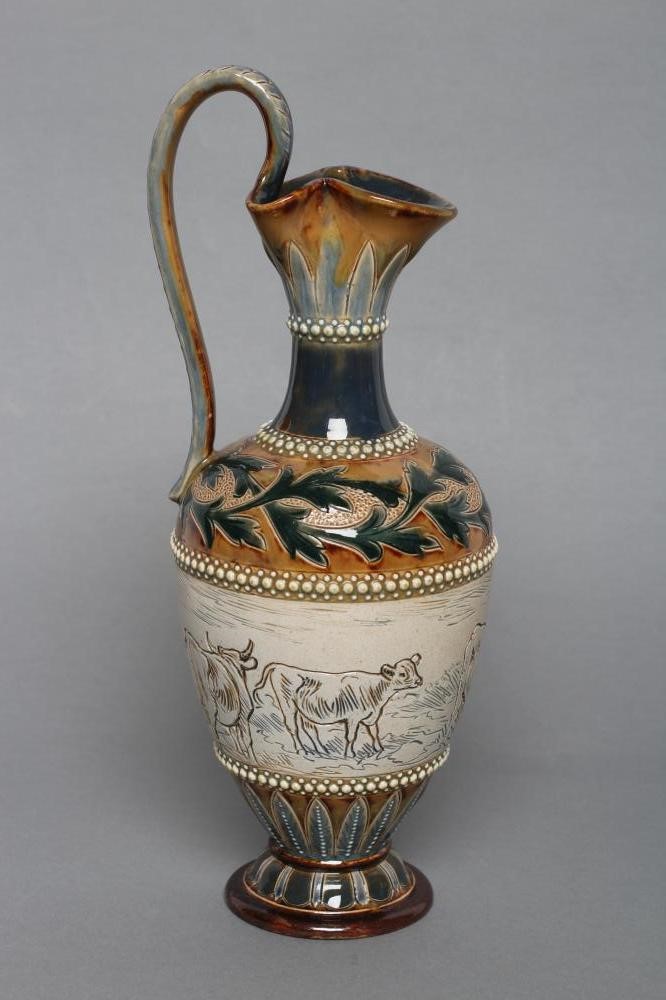 A LATE VICTORIAN DOULTON LAMBETH STONEWARE EWER BY HANNAH BARLOW of ovoid form with high loop handle Image