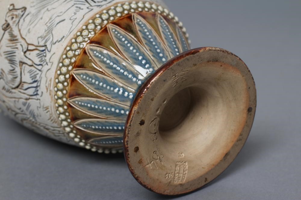 A LATE VICTORIAN DOULTON LAMBETH STONEWARE EWER BY HANNAH BARLOW of ovoid form with high loop handle Image