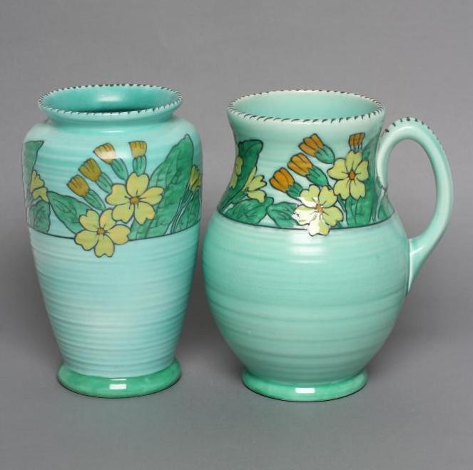 A CHARLOTTE RHEAD FOR CROWN DUCAL ART DECO POTTERY PRIMROSE PATTERN JUG of lightly ribbed baluster Image