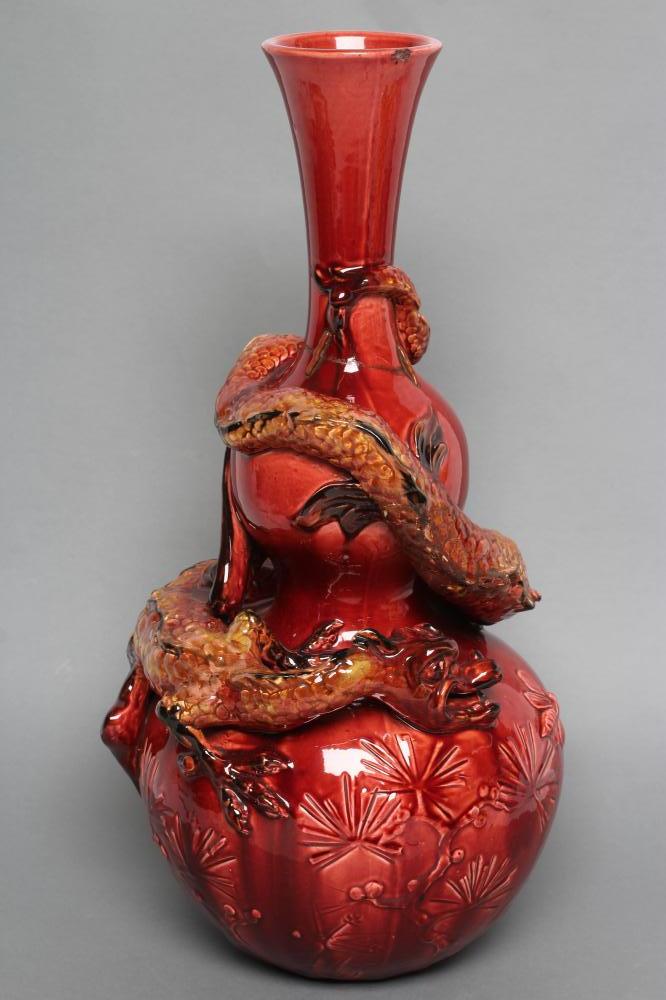 A BURMANTOFTS FAIENCE RED GLAZED DOUBLE GOURD VASE Image