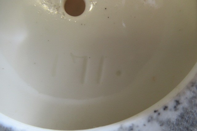 "A JESTER" - a Royal Doulton china figure Image