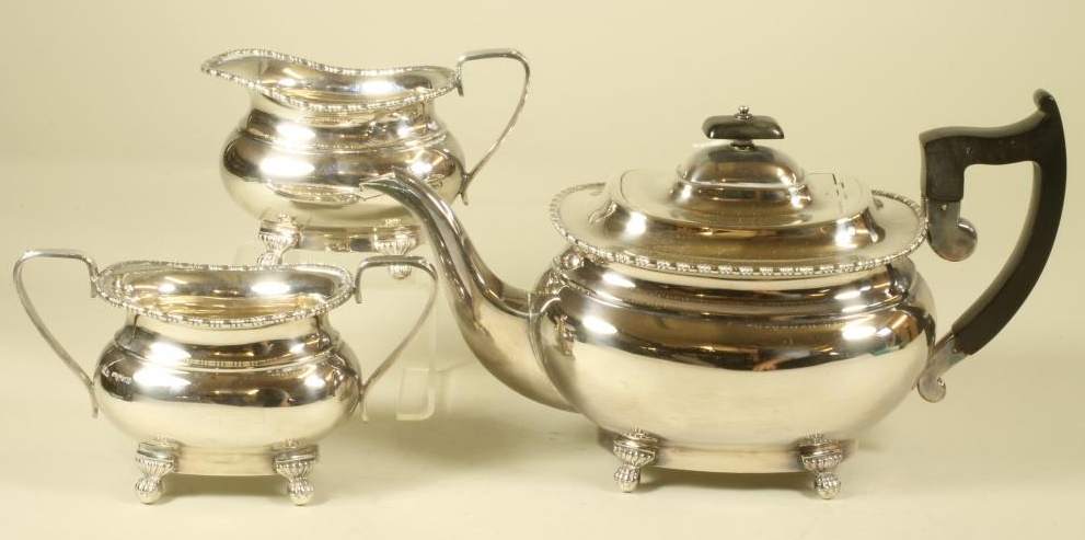 *A THREE PIECE SILVER TEA SERVICE Image