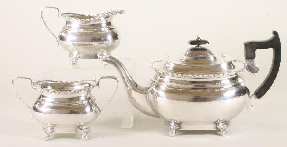 *A THREE PIECE SILVER TEA SERVICE Image